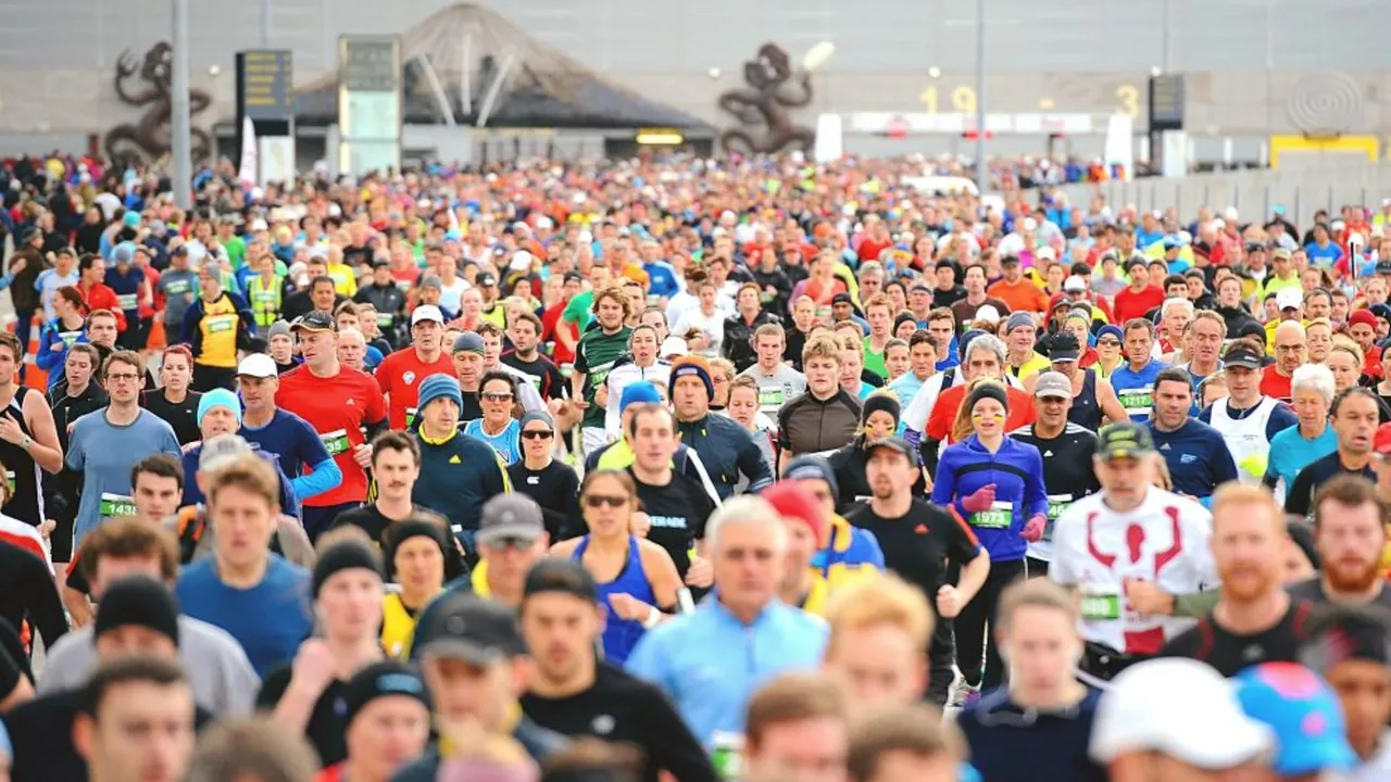 A packed field of runners at the start line of the Wellington Marathon.